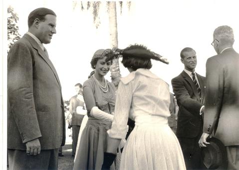 Governor of Uganda Sir Andrew Cohen (L) and meets residents and staff of the Uganda Protectorate on 6th January 1957