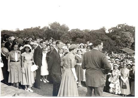 Governor of Uganda Sir Andrew Cohen (L) and meets residents and staff of the Uganda Protectorate on 6th January 1957