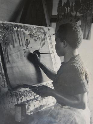 A student paints during the early years of the Margaret Trowell School of Industrial and Fine Arts (MTSIFA) founded in 1937, Makerere University, Kampala Uganda