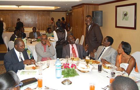 Acting Vice Chancellor Prof. V. Baryamureeba mingles with colleagues L-R Dr. M. Ntale, Head, Chemistry, Assoc. Prof. A. Mugisha, Dean, SVAR, CoVAB, Dr. J. Mango, Dean, SPS, CoNAS, Assoc. Prof. J. Mbabazi, Chemistry and Mrs. Mbabazi.