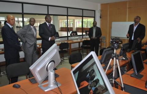 L-R Chancellor Prof. Kagonyera, Chairperson Council Hon. Rukikaire, ICT Minister Hon. Ham Muliira receive a guided tour of the Multimedia Lab by Senior PRO Gilbert Kadilo and CIT Head of Corporate Relations Michael Niyitegeka, CIT, 28th January 2009