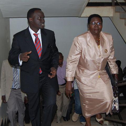 Mr. Ibrahim Kaliisa, Assistant Presidential Advisor on ICT (L) and Hon. Syda Bbumba, Minister of Finance, Planning and Economic Development make their way to the Lab at the National BPO Training Launch, 17th January 2011, CoCIS, Makerere University, Kampala Uganda.