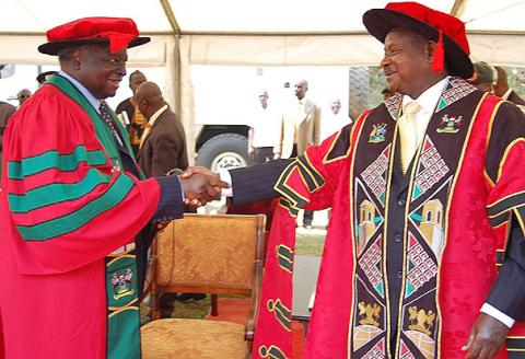President Mwai Kibaki is congratulated upon receiving his Honorary Doctor of Laws Award by President Yoweri Kaguta Museveni on 24th January 2012, Makerere University, Kampala Uganda.
