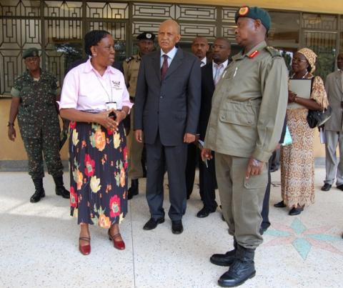 University Librarian, Prof. G.M. Musoke (2nd L) explains to President Museveni the Library expansion over the years as Prof. G.M. Kagonyera, Chancellor (3rd L) listens on 4th August 2012, Makerere University, Kampala Uganda.