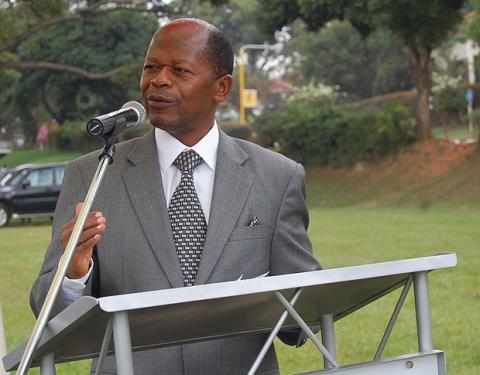 State Minister for Higher Education, Dr. Chrysostom Muyingo addresses the congregation at the Freedom Square during the launch of year-long celebrations to mark 90 years on 4th August 2012, Makerere University, Kampala Uganda.