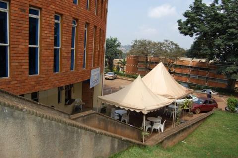 The Canteen of the St. Francis Community Centre, with Lumumba Hall in the background, Dedicated on 9th January 2005 by the Most Rev. Henry Luke Orombi, Makerere University, Kampala Uganda. Canteen housed Maranatha Cafe as of August 2012