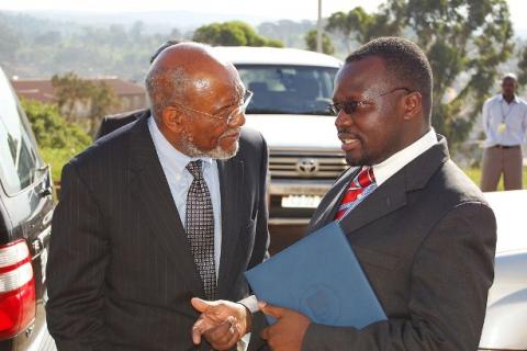 Amb. Johnnie Carson (L) chats with Ag. Vice Chancellor Prof. V. Baryamureeba after the Deputy Secretary's Public Lecture on US Foreign Policy in Africa, 4th February 2011, Makererere University, Kampala Uganda.