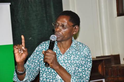 Mr. Aaron Mukwaya-CHUSS a discussant reacts to comments from the audience during the 2nd Joshua Mugyenyi Memorial Lecture, 15th March 2013, Makerere University, Kampala Uganda.