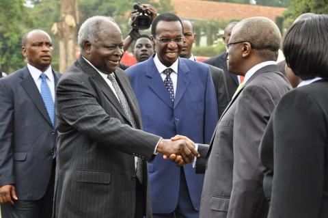 H.E. Dr. Mwai Kibaki is received upon arrival for the Mak@90 Grand Finale Celebrations by Rt. Hon. Amama Mbabazi (2nd R), 3rd August 2013, Makerere University, Kampala Uganda.