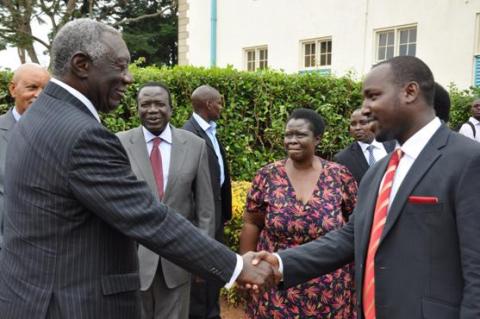 Mr. Bruce Kabaasa, Chairperson Makerere University Convocation (R) as part of the delegation, receives H.E. John Kufuor to deliver a Public Lecture on Oil, Mak@90, 2nd August 2013 Makerere University, Kampala Uganda.