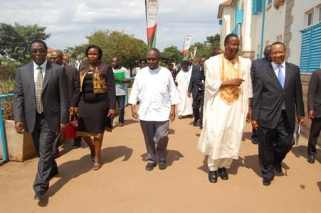 Vice Chancellor Prof. J. Ddumba-Ssentamu (L) leads L-R Hon. Jessica Alupo, Prof. Ngugi wa Thiong'o, Prof. Ephraim Kamuntu and Rt. Hon. Apolo Nsibambi to a tour of the mini-exhibition at the UEA 50th Anniversary celebrations 29th June 2013, Makerere University, Kampala Uganda.